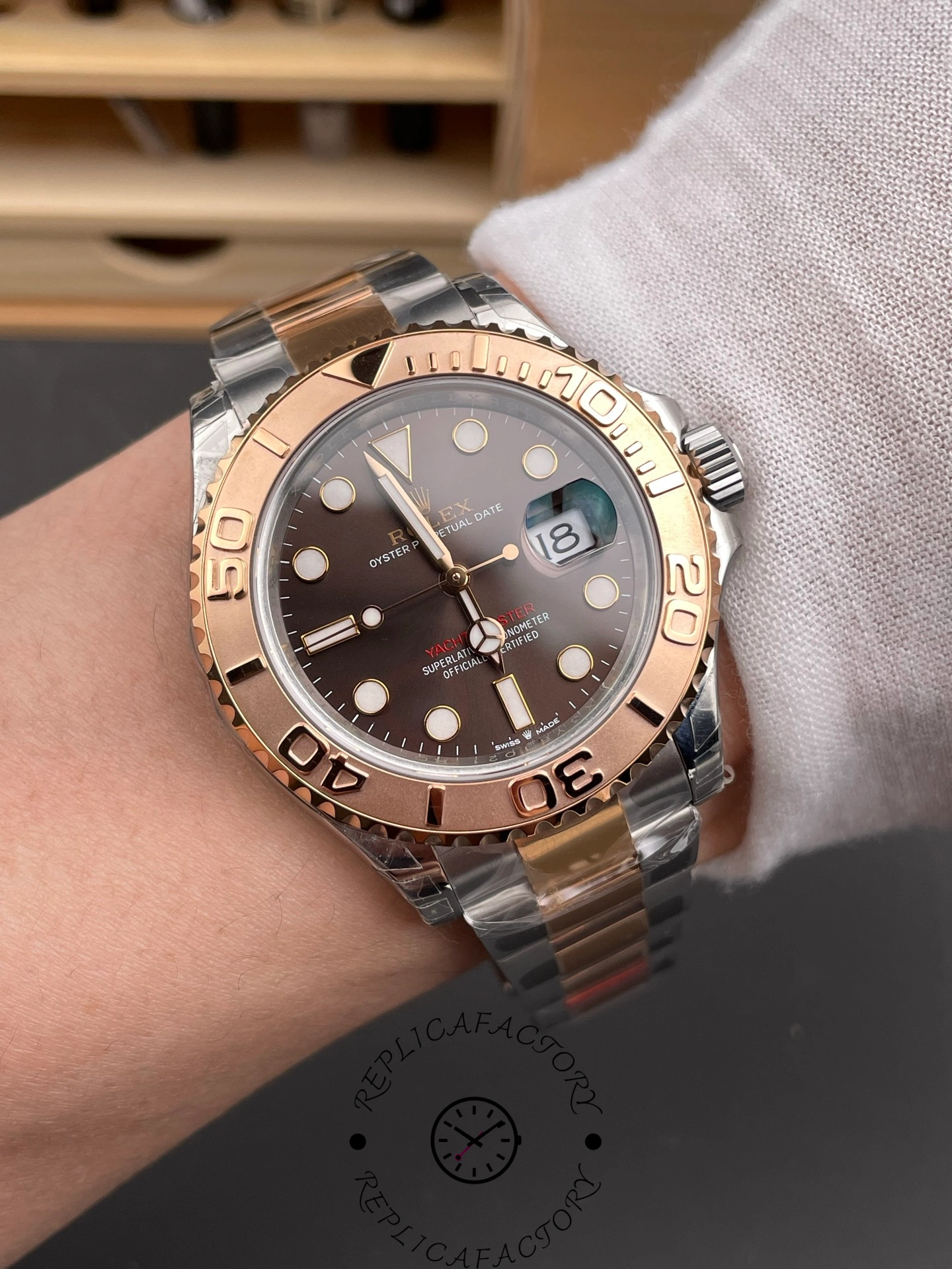 Rolex Yacht-Master 126621 on wrist, 40mm brown dial and bezel, rolesor bracelet, front view.