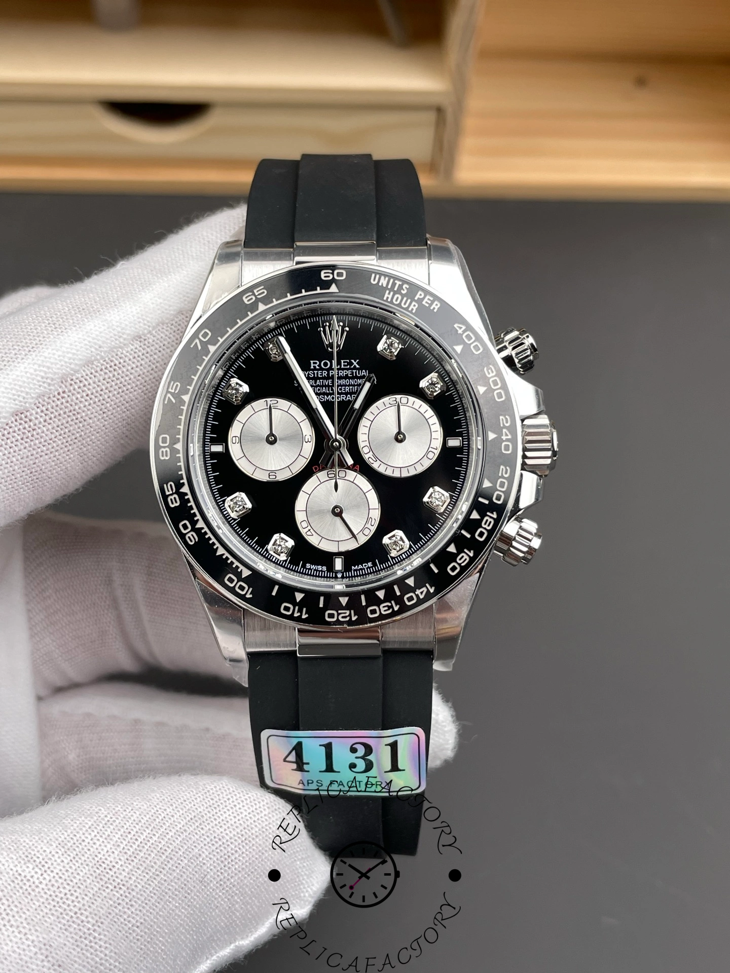 Front view of the Rolex Cosmograph Daytona White Gold 126519LN 0004 with black dial and subdials.
