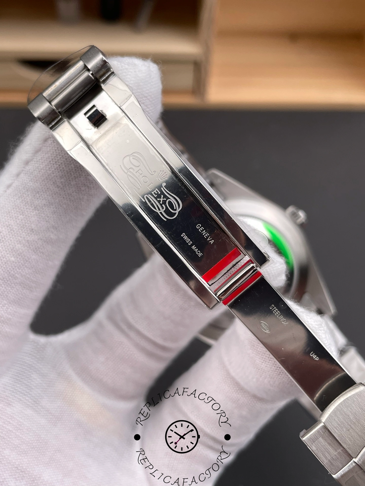 Rolex Oyster Perpetual 114300 clasp close-up, Rolex coronet on clasp.