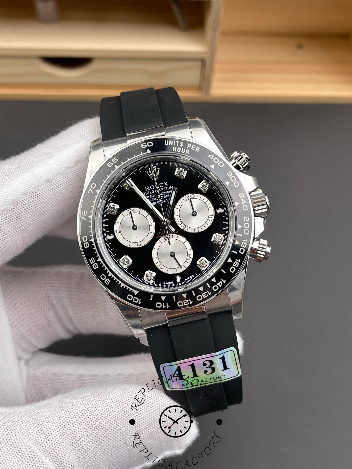 Angled front view of the Rolex Cosmograph Daytona White Gold 126519LN 0004 with steel bezel.