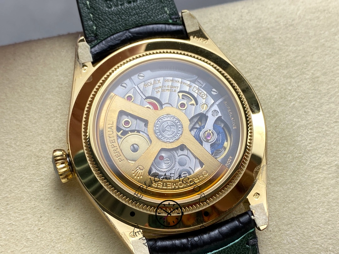 Exhibition caseback of Rolex 1908 Yellow Gold 52508-0002 replica revealing automatic movement and gold rotor.