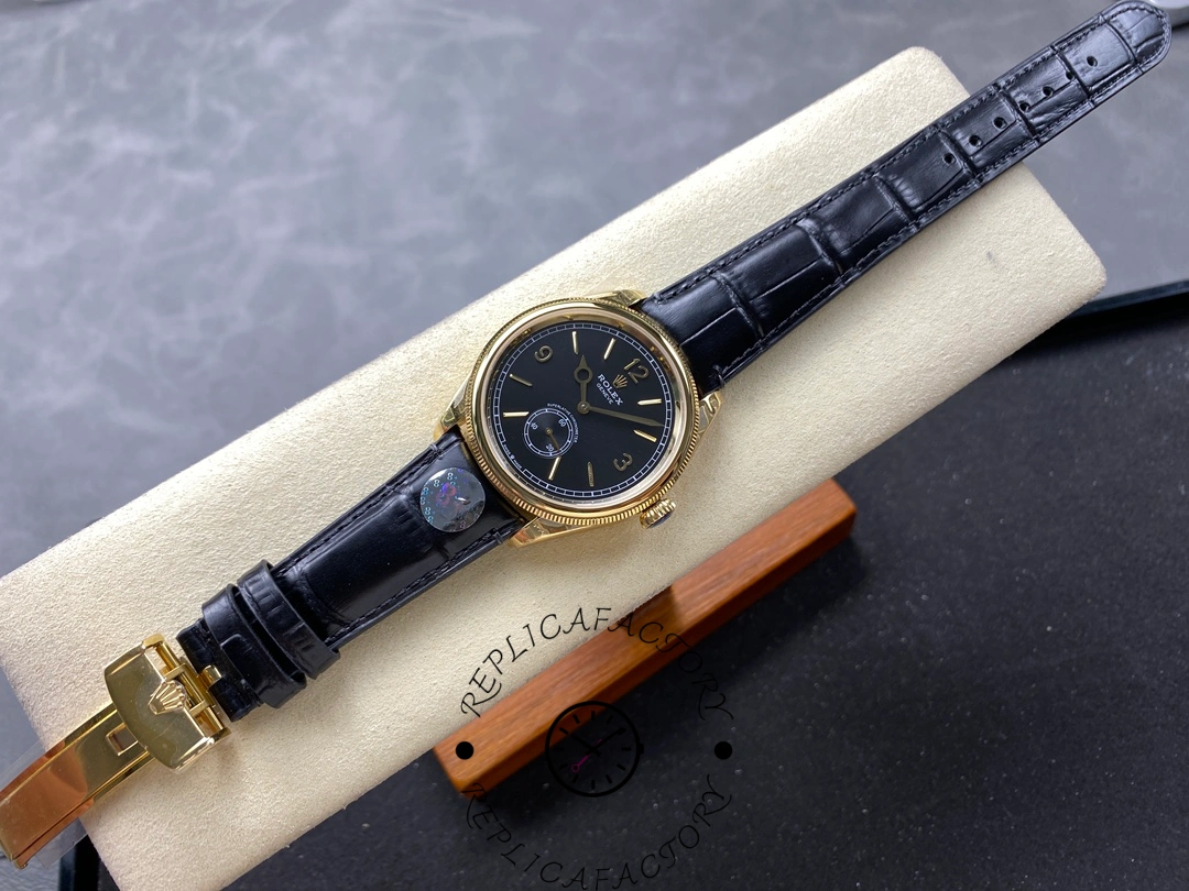 Full watch laid flat of Rolex 1908 Yellow Gold 52508-0002 replica highlighting slim dress watch proportions.