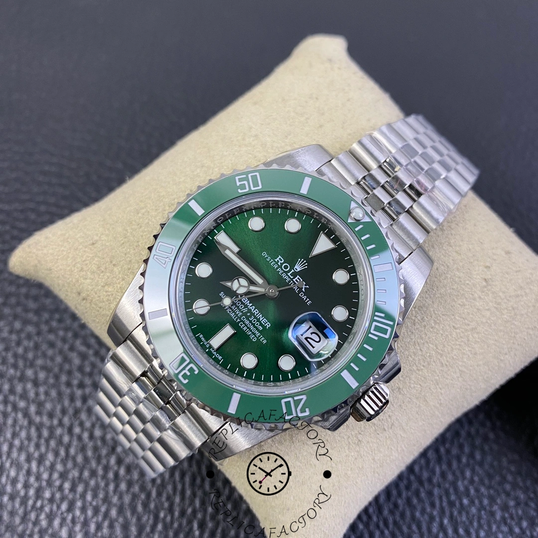 Top view of Rolex Submariner 116610LV on cushion, green dial with jubilee bracelet.