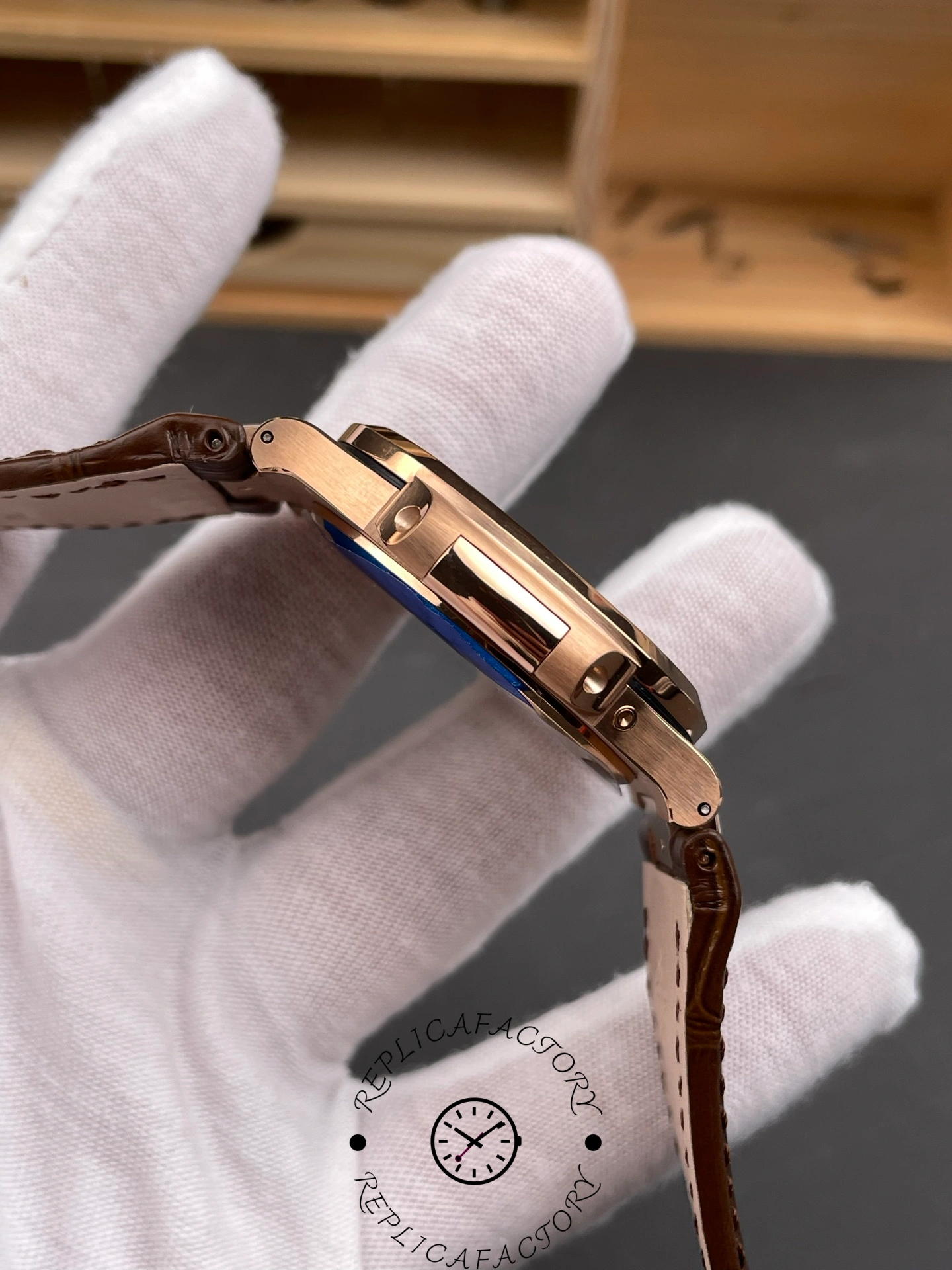 Low side view of Patek Philippe Nautilus 5724-001 highlighting polished case edge and lug curve.