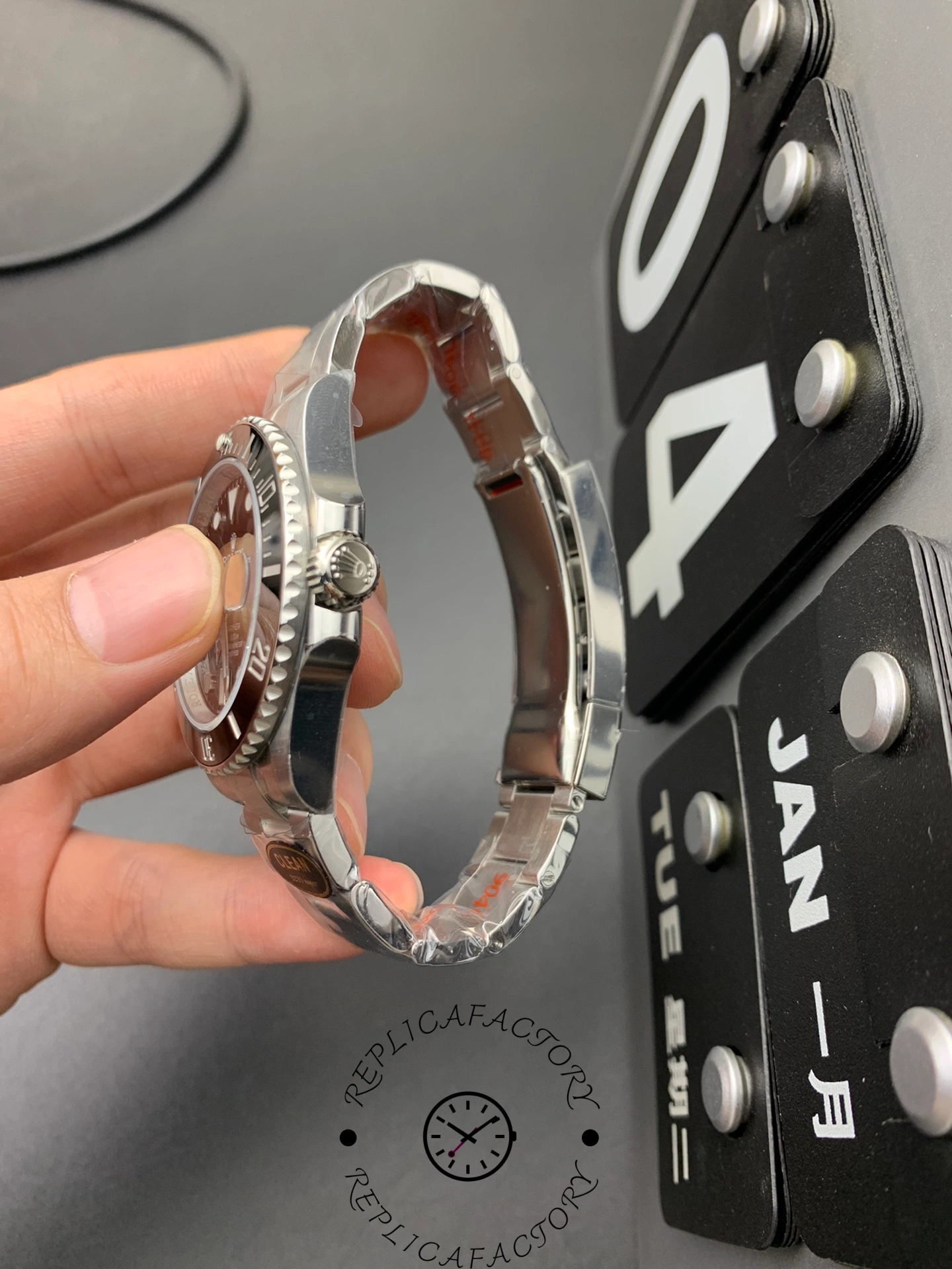 Rolex Submariner 116610LN 0001, crown-side profile highlighting polished case flank and lug shape.