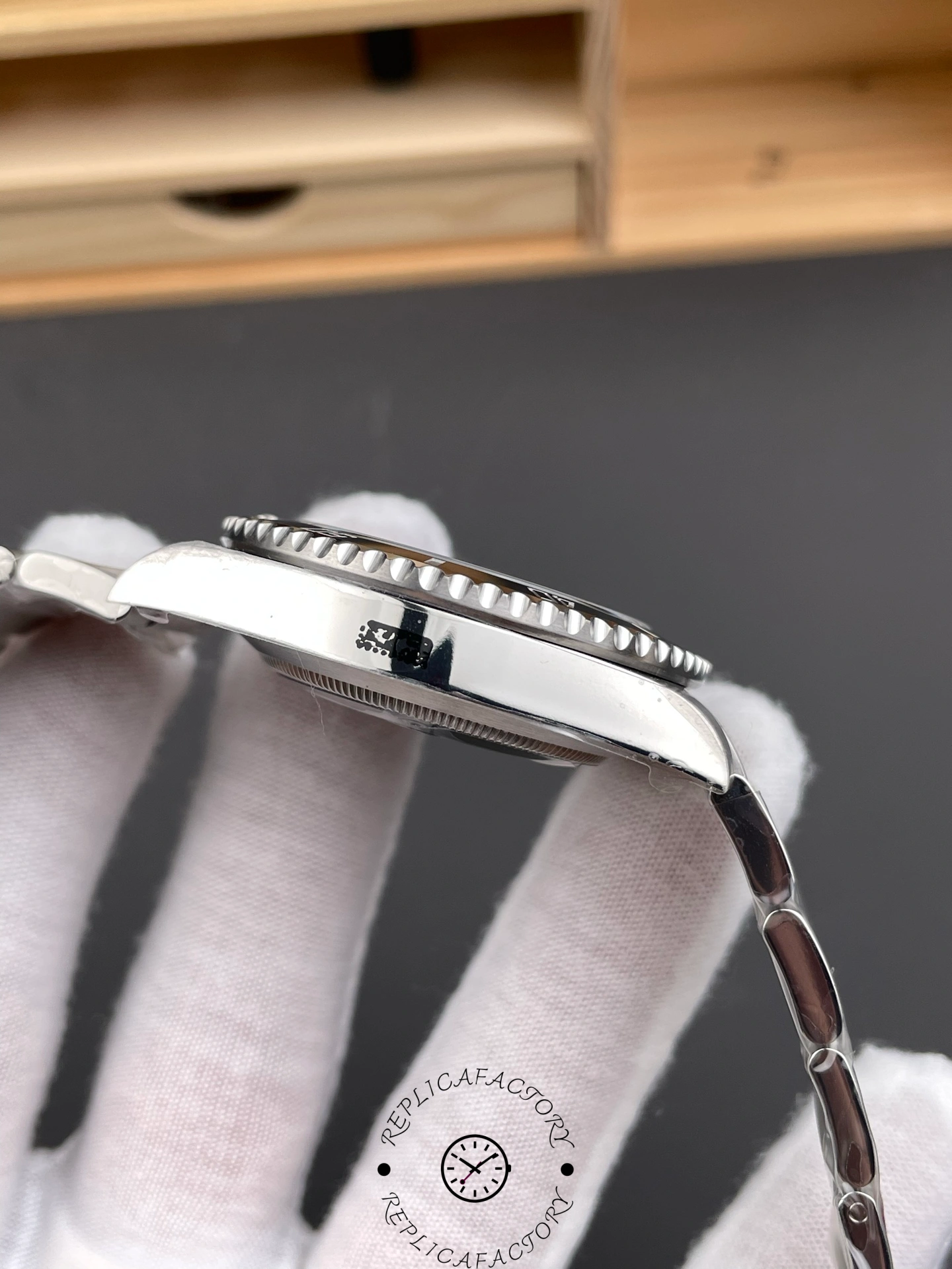 Rolex Submariner 126610LN 0001 side view, showing case thickness and bezel profile.