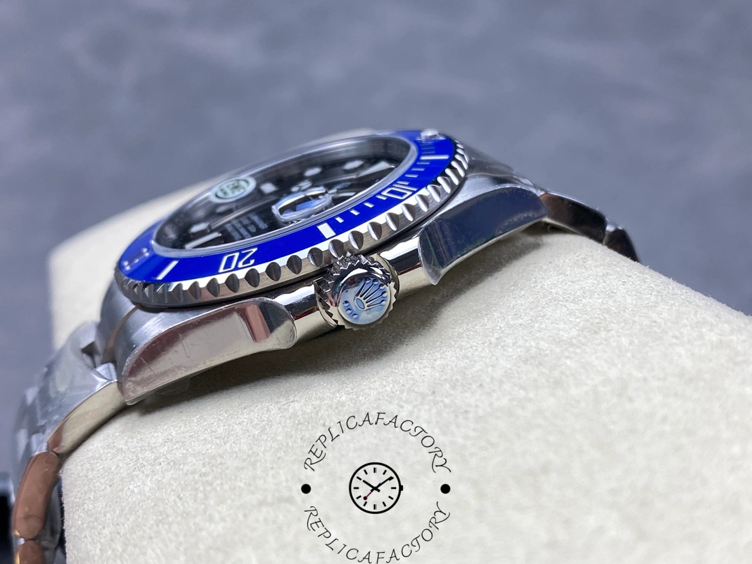 Rolex Submariner 126619LB 0003, low side view highlighting crown with blue ceramic bezel.