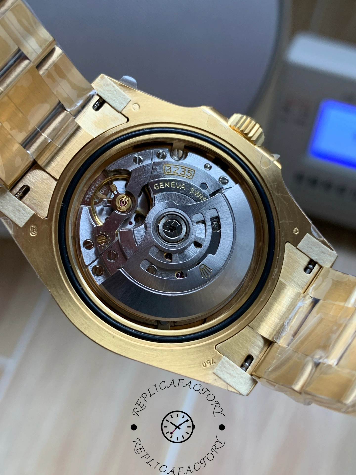 Rolex Submariner 126618LN, case back view showing movement through opening.