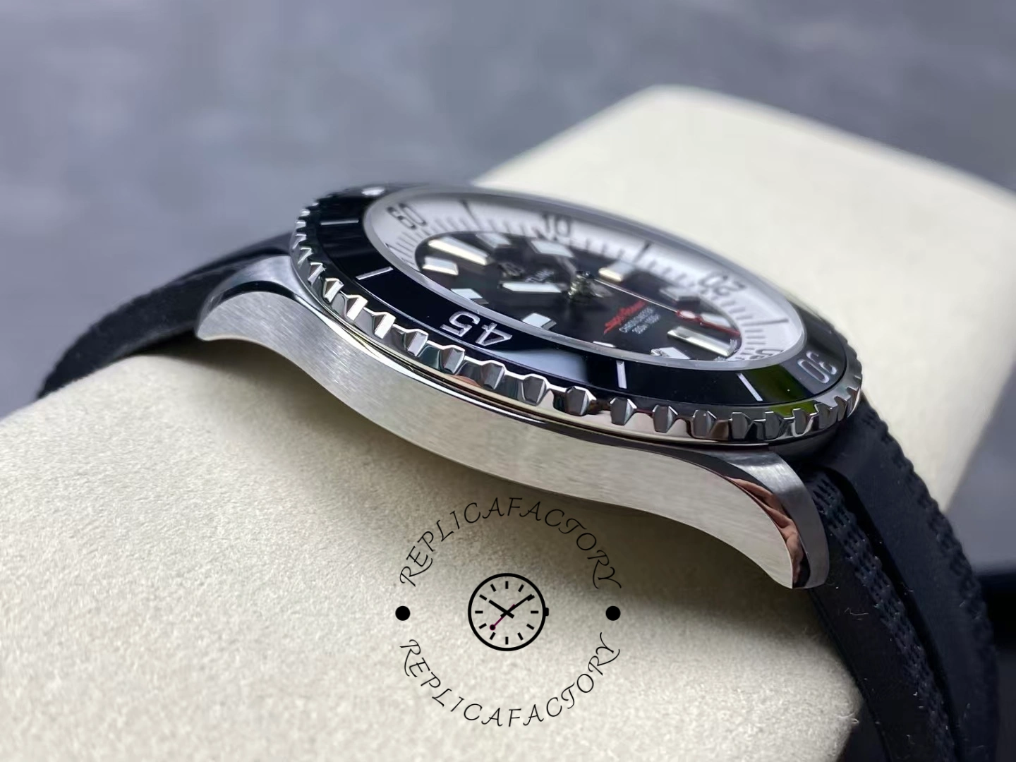 Breitling Superocean A17376211B1S1, side profile on cushion showing case thickness and bezel height.