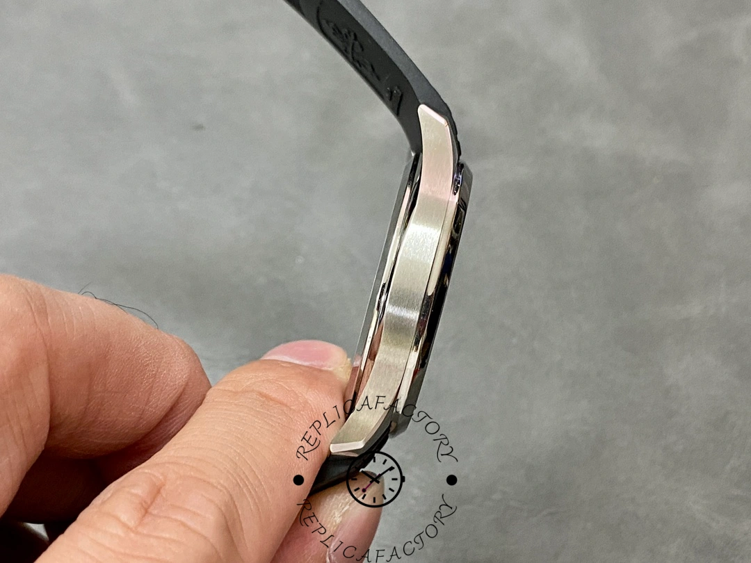 Side profile close-up of Patek Philippe Aquanaut 5167A-001 showing case edge and strap curve.