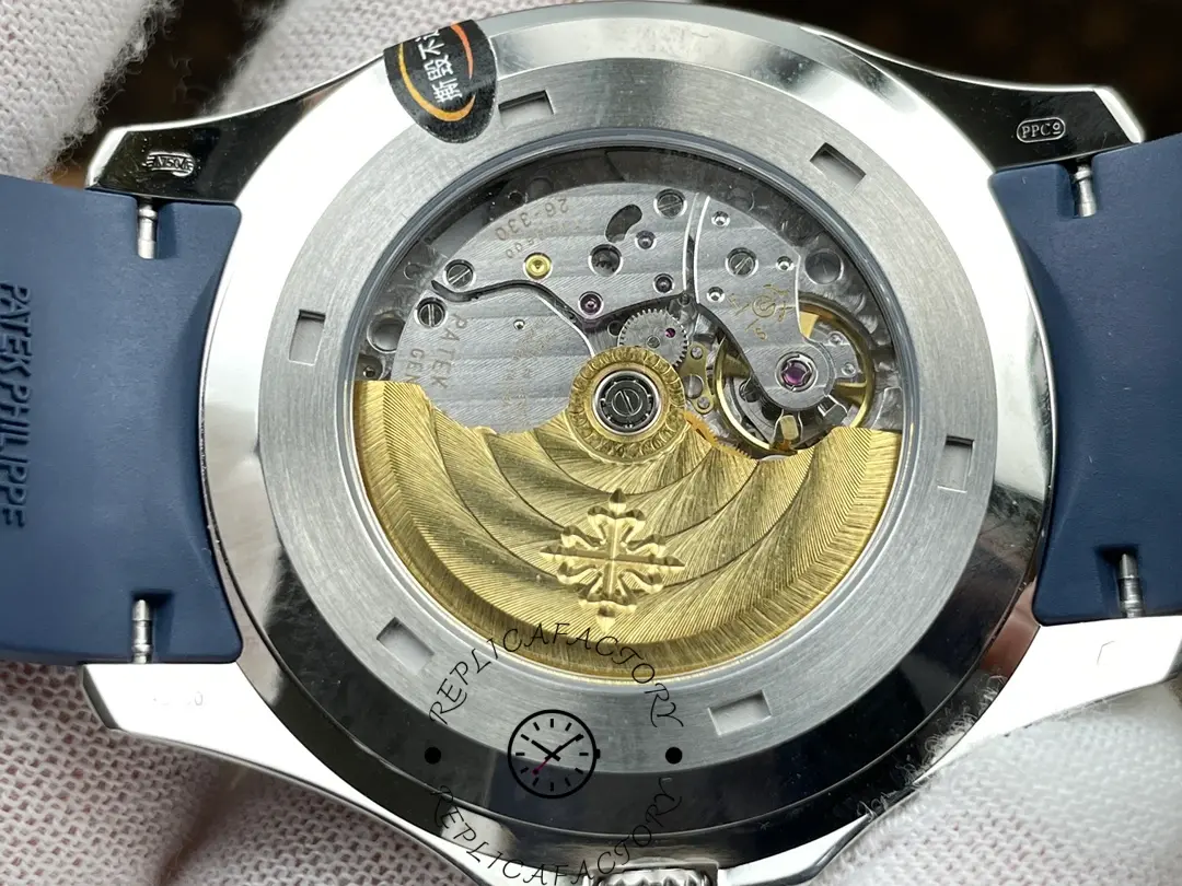 Caseback close-up of Patek Philippe Aquanaut 5168G-001 showing rotor and sapphire back.