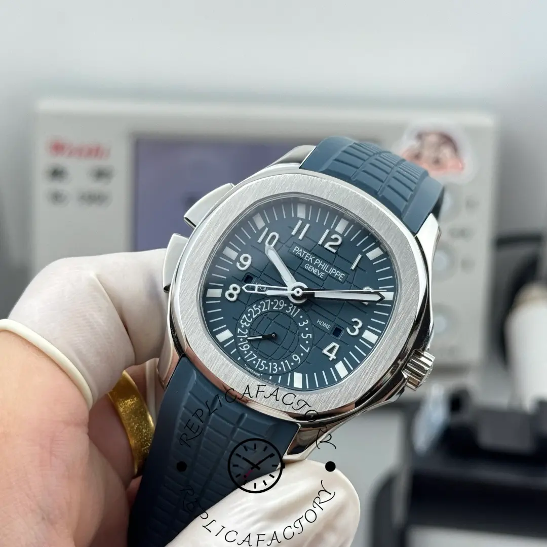 Angled hand-held Patek Philippe Aquanaut 5164G-001 showing strap grooves and case side finish.