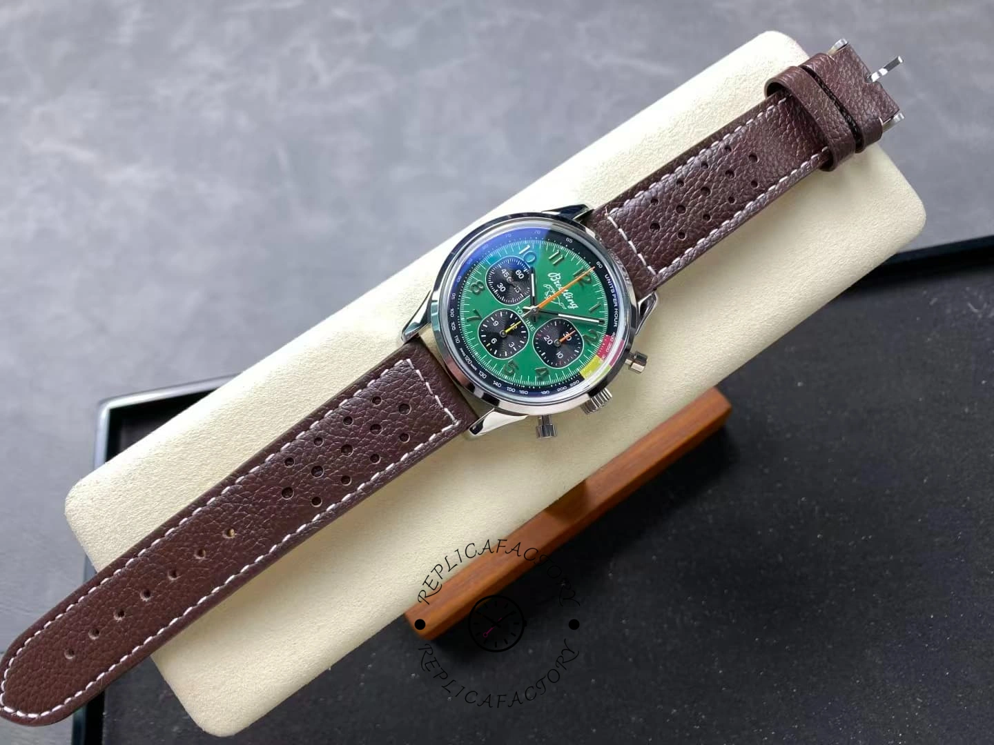 Full watch shot of Breitling Top Time B01 AB01762A1L1X1 on brown leather strap, viewed from above.