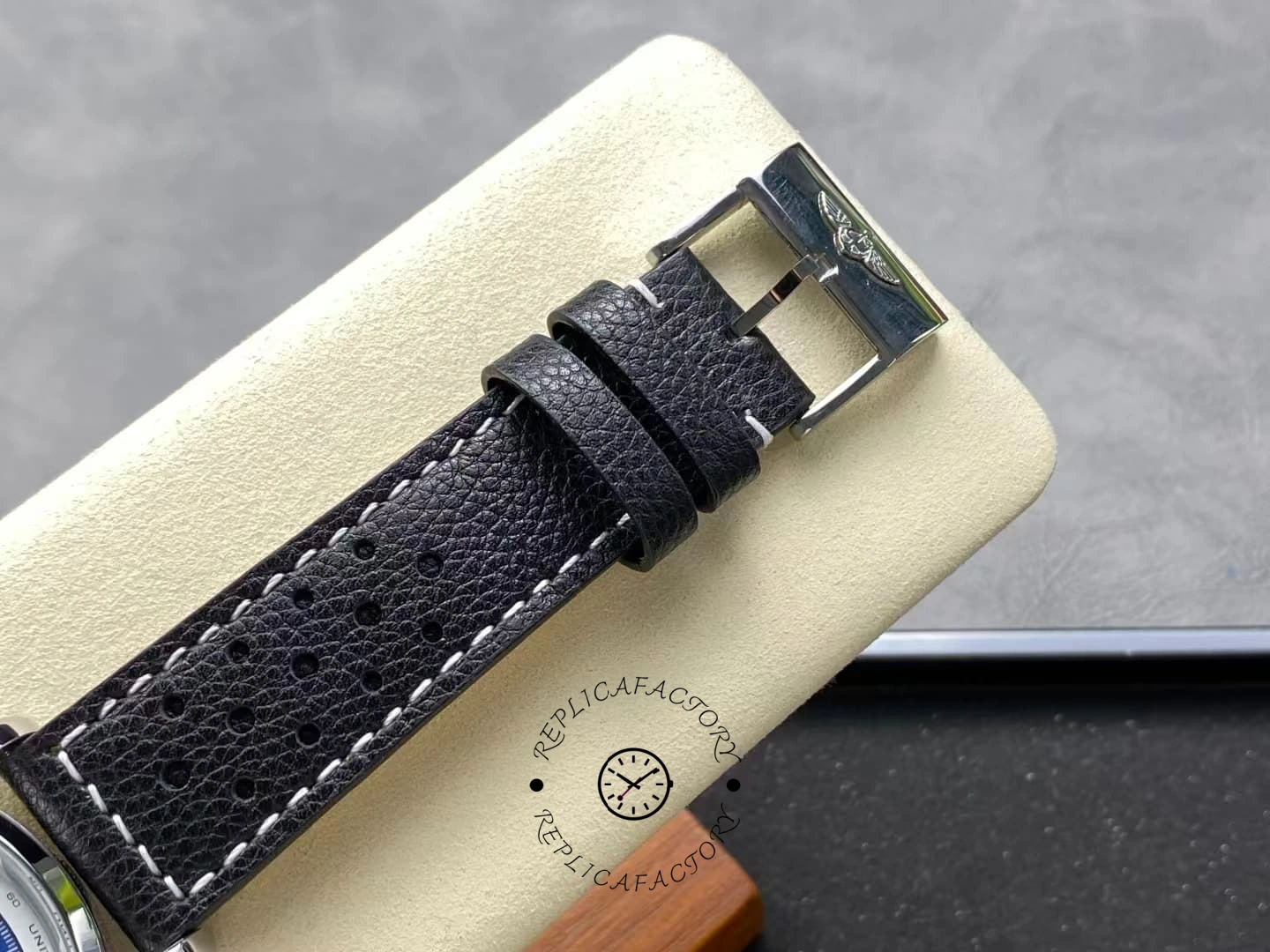 Breitling Top Time B01 Shelby Cobra AB01763A1C1X1, strap end close-up showing buckle and perforations.