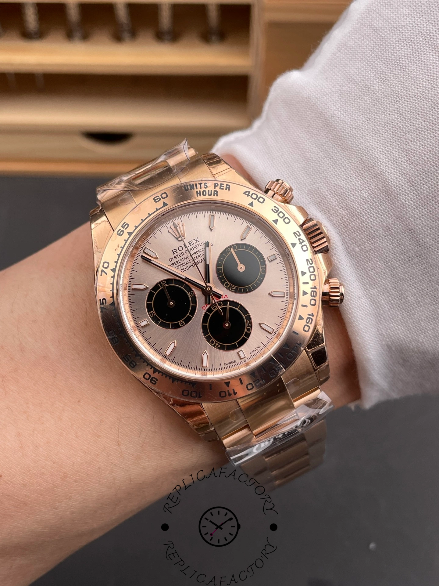 Wrist shot of the Rolex Daytona 126505 showing full sundust panda dial on Everose bracelet.