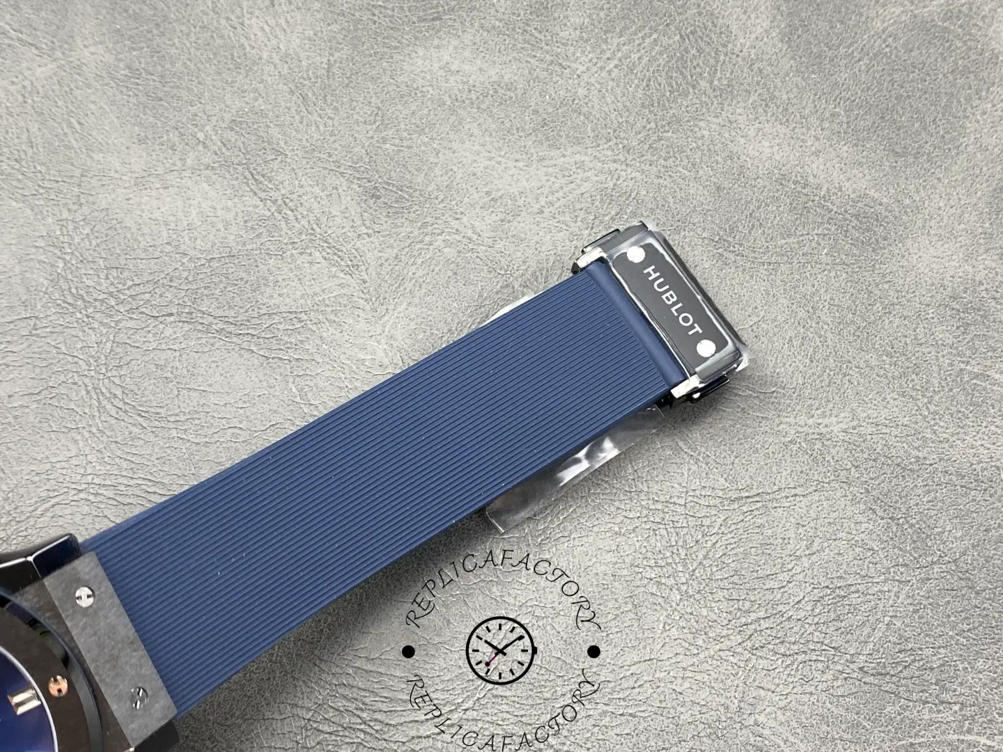 Hublot Classic Fusion 542.CM.7170.RX, strap tail close-up showing material and finish.