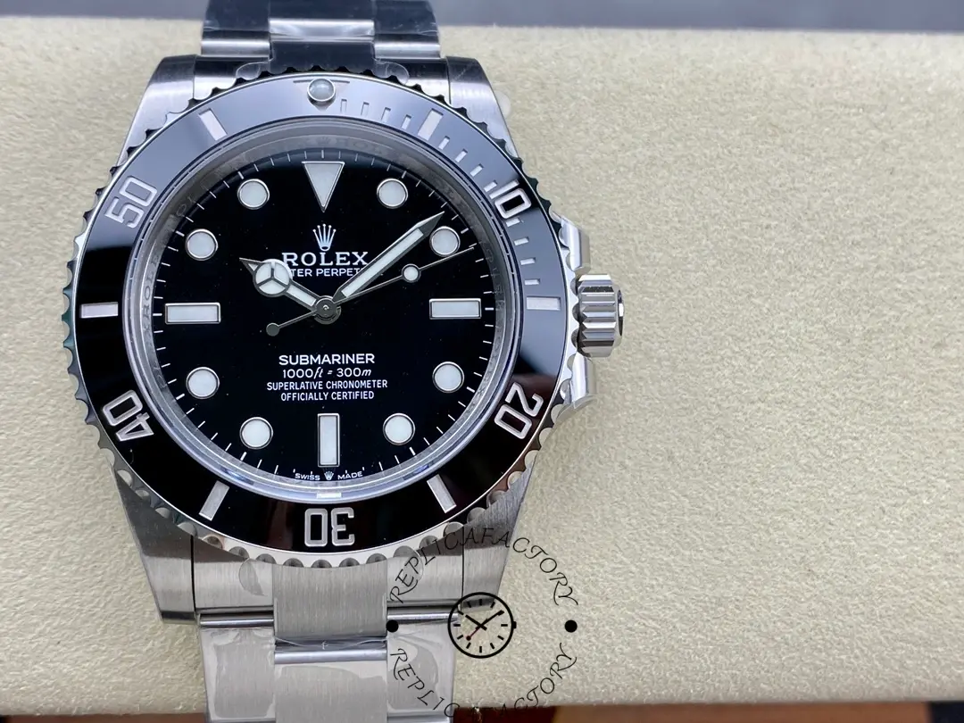 Rolex Submariner 124060, dial close-up on cushion, black dial.