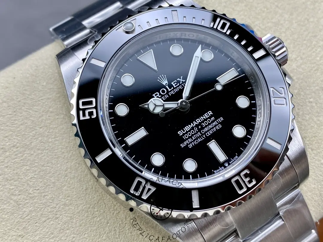 Rolex Submariner 124060, macro dial shot showing hour markers and hands.