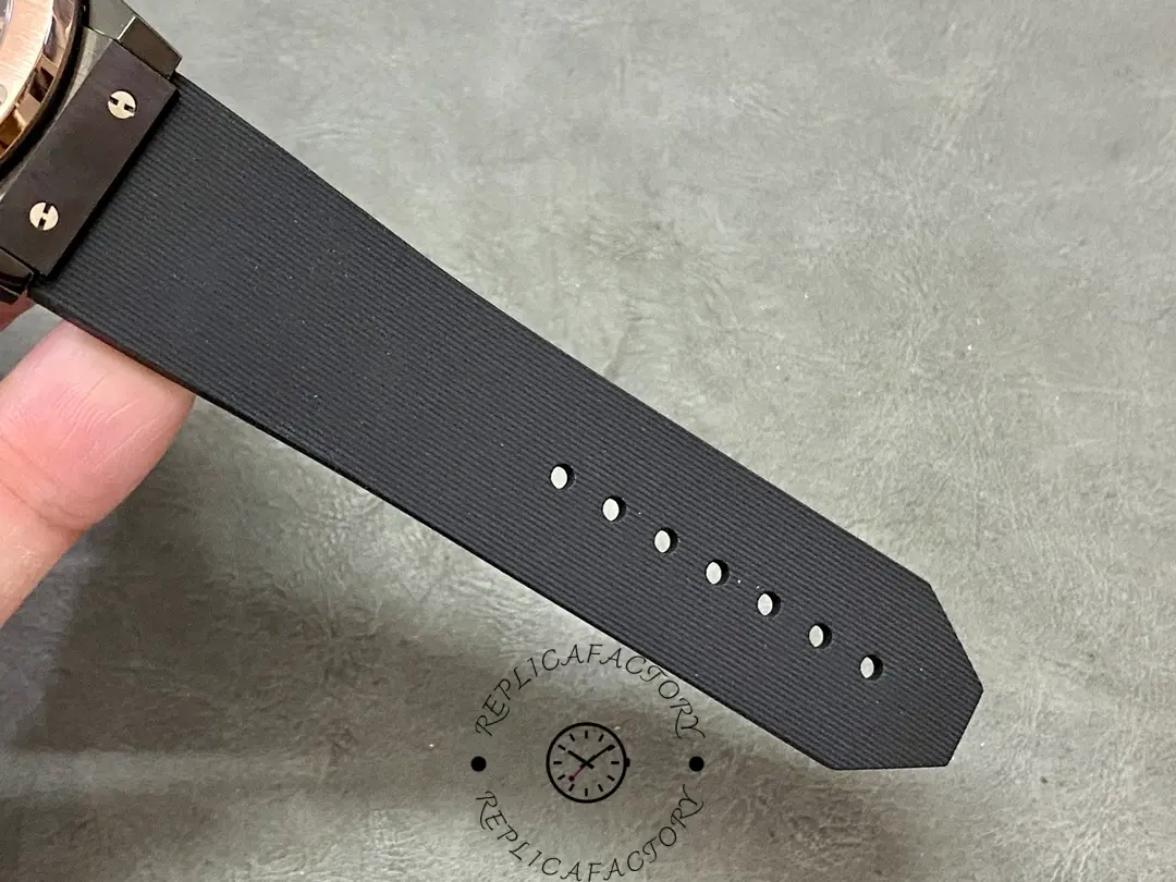 Strap holes close-up of Hublot Classic Fusion 521.CO.1781.RX showing perforations and strap finish.