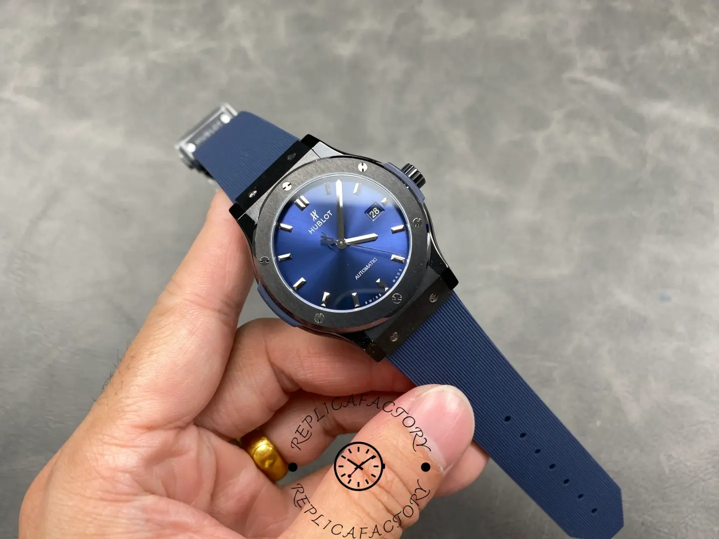 Hublot Classic Fusion 542.CM.7170.RX, full watch in hand showing case and strap proportion.