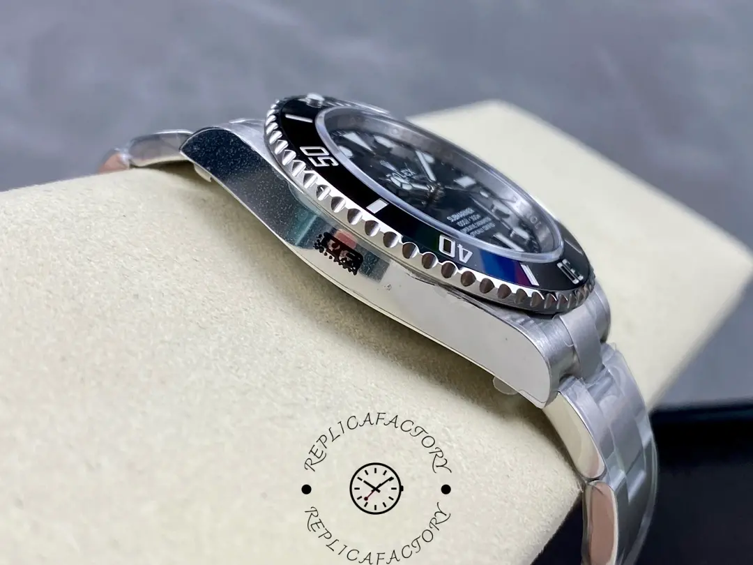 Rolex Submariner 124060, side profile on cushion showing case lines.