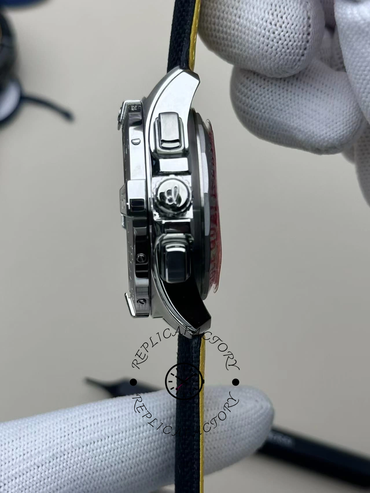 Crown-side close-up of Breitling Avenger B01 AB0146101B1X1 showing signed crown and case finish.