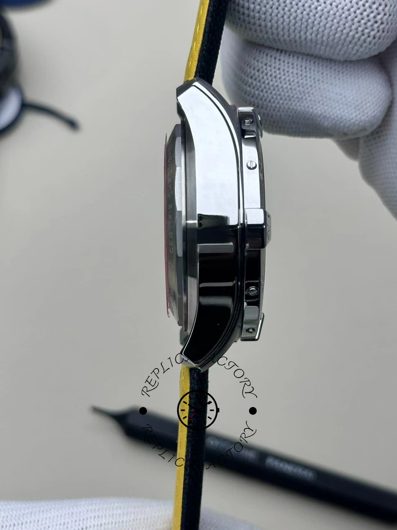 Side profile of Breitling Avenger B01 AB0146101B1X1 showing case thickness and pushers alignment.