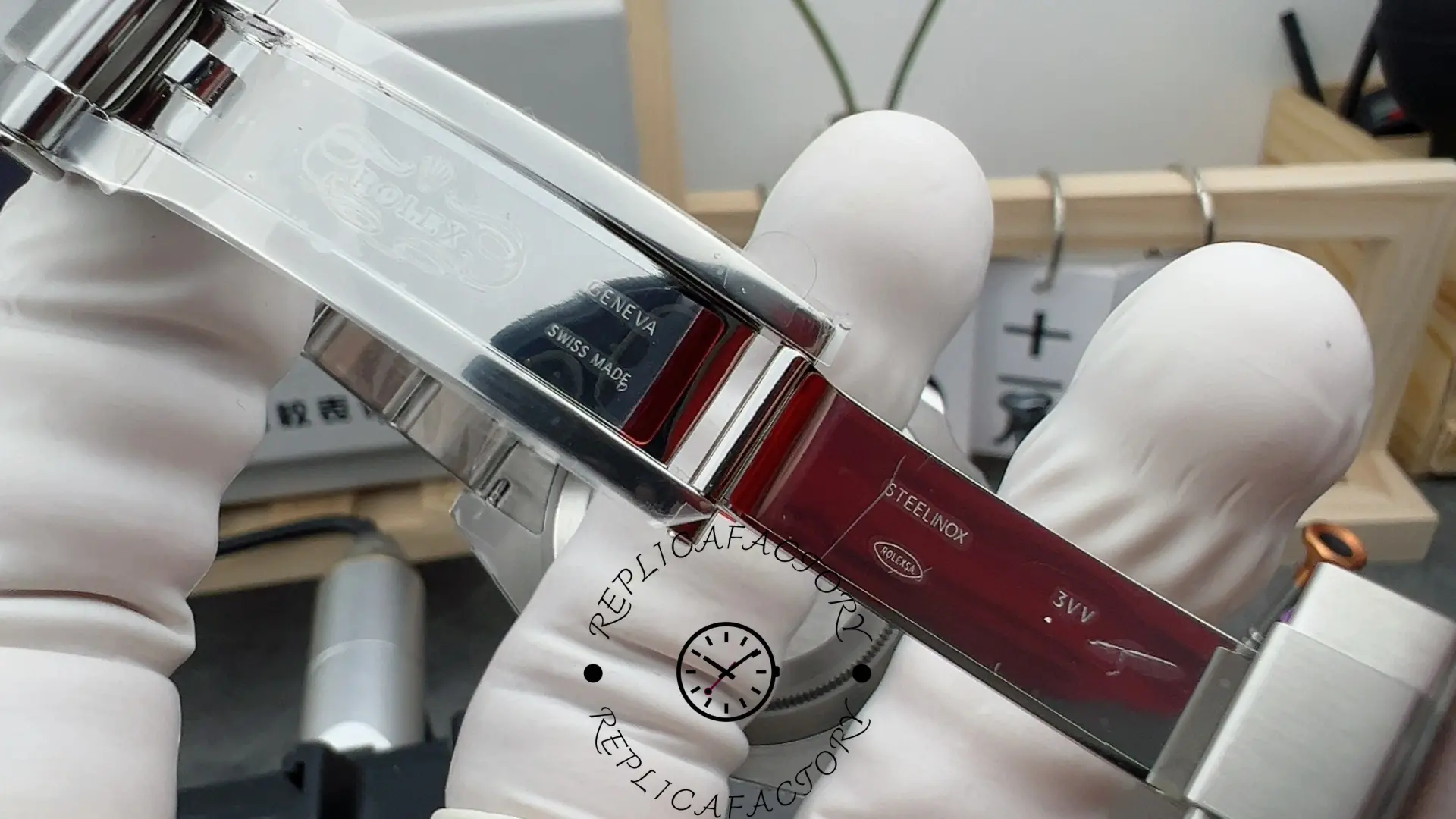 Rolex Submariner 126610LV, bracelet opened to show Oyster links and clasp structure.