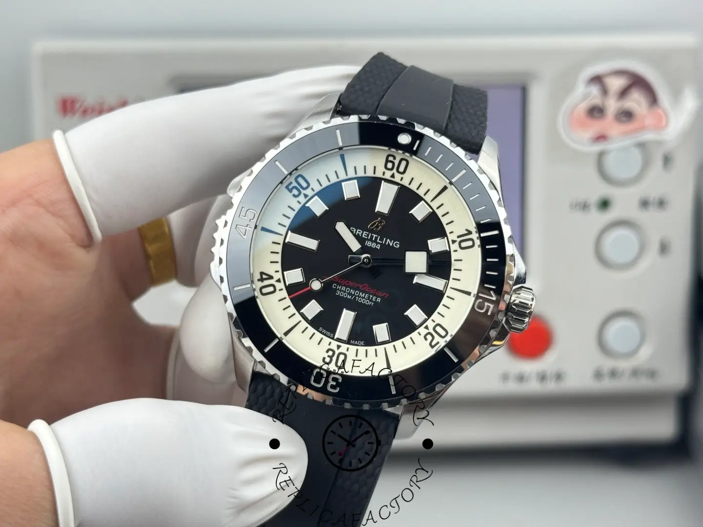 Hand-held close-up of Breitling Superocean A17378211B1S1 highlighting bold indices and hands.