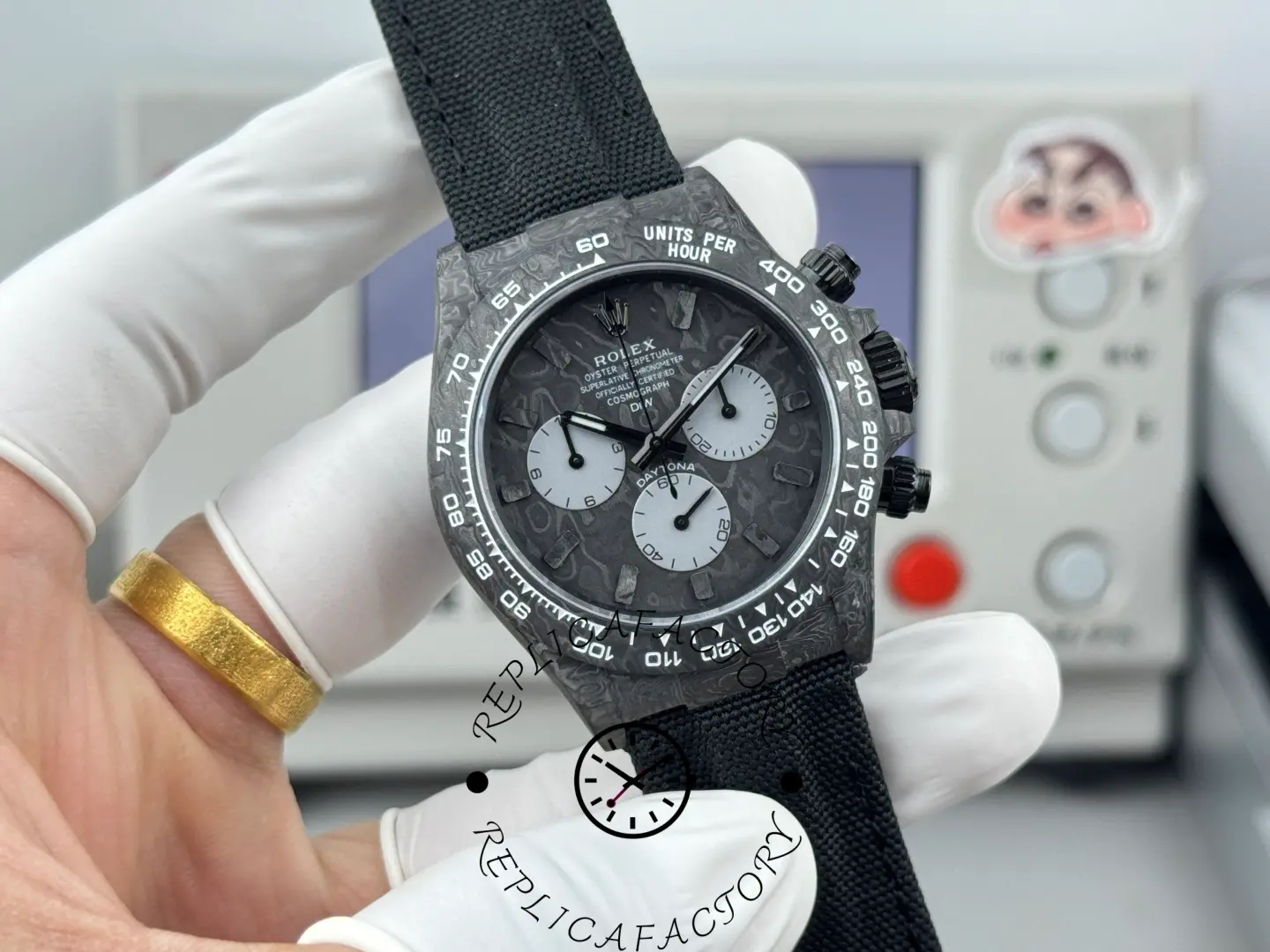 Replica Rolex DiW Daytona All Carbon Graphite 40mm, angled front view showing carbon case and bezel.