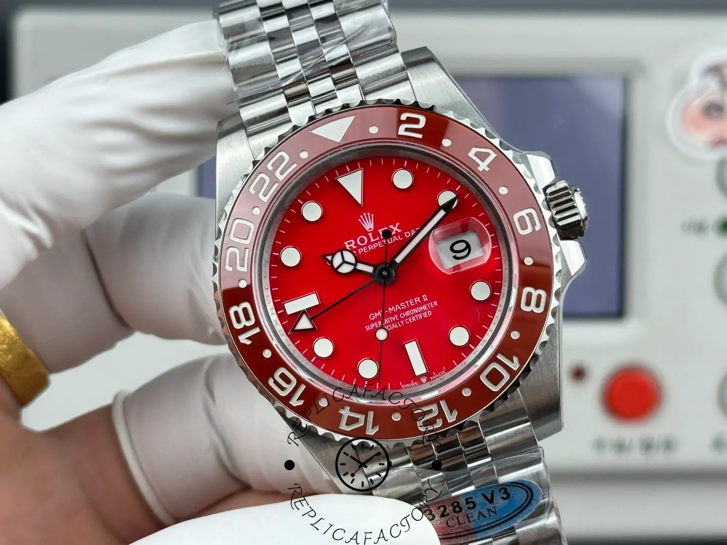 Close-up of Rolex GMT-Master II 126710 showing red dial details and hands.