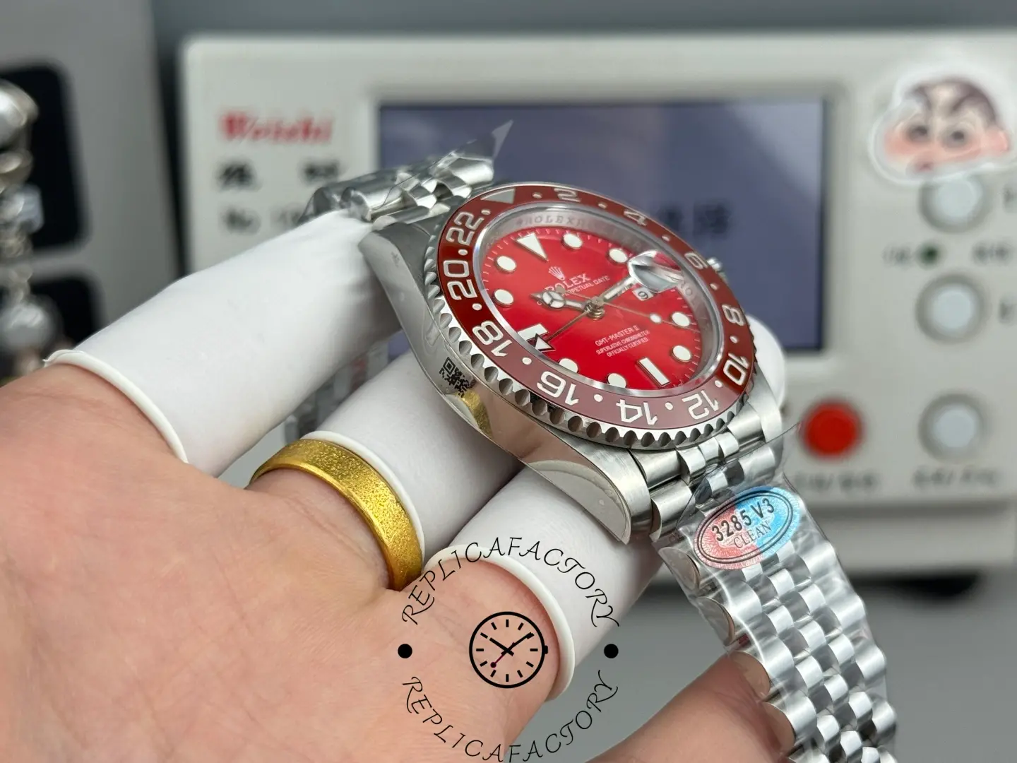 Wrist shot of Rolex GMT-Master II 126710 showing red dial and stainless steel bracelet fit.