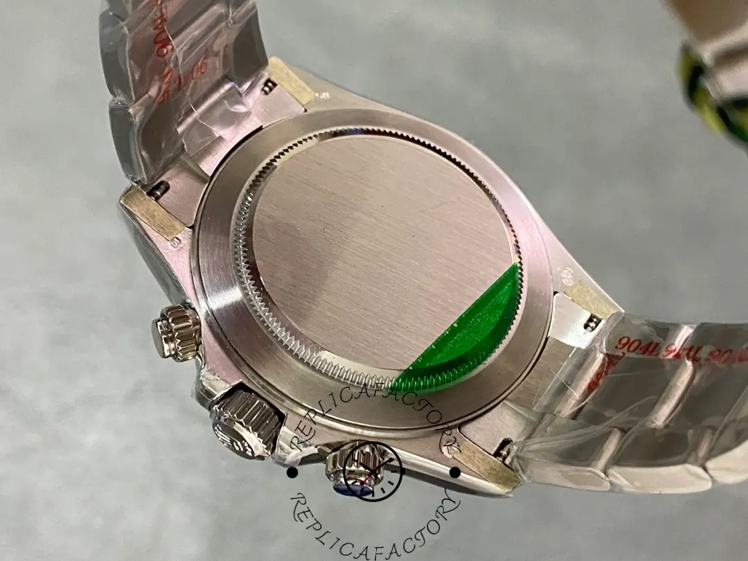 Rolex Daytona 116576TBR, caseback view with protective film, showing the solid back and end links.