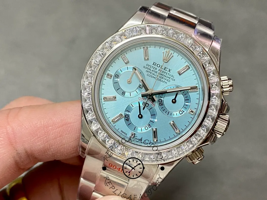 Rolex Daytona 116576TBR, tight dial crop showing applied markers, subdials, and diamond bezel details.