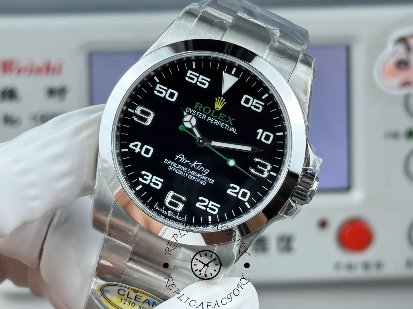 Rolex Air-King 126900 0001, dial close-up showing hands, lume plots, and minute numerals.