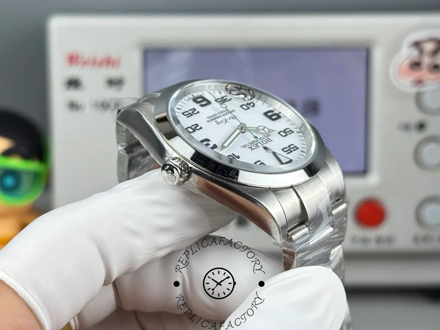 Rolex Air-King 126900 side profile showing crown and bracelet links.