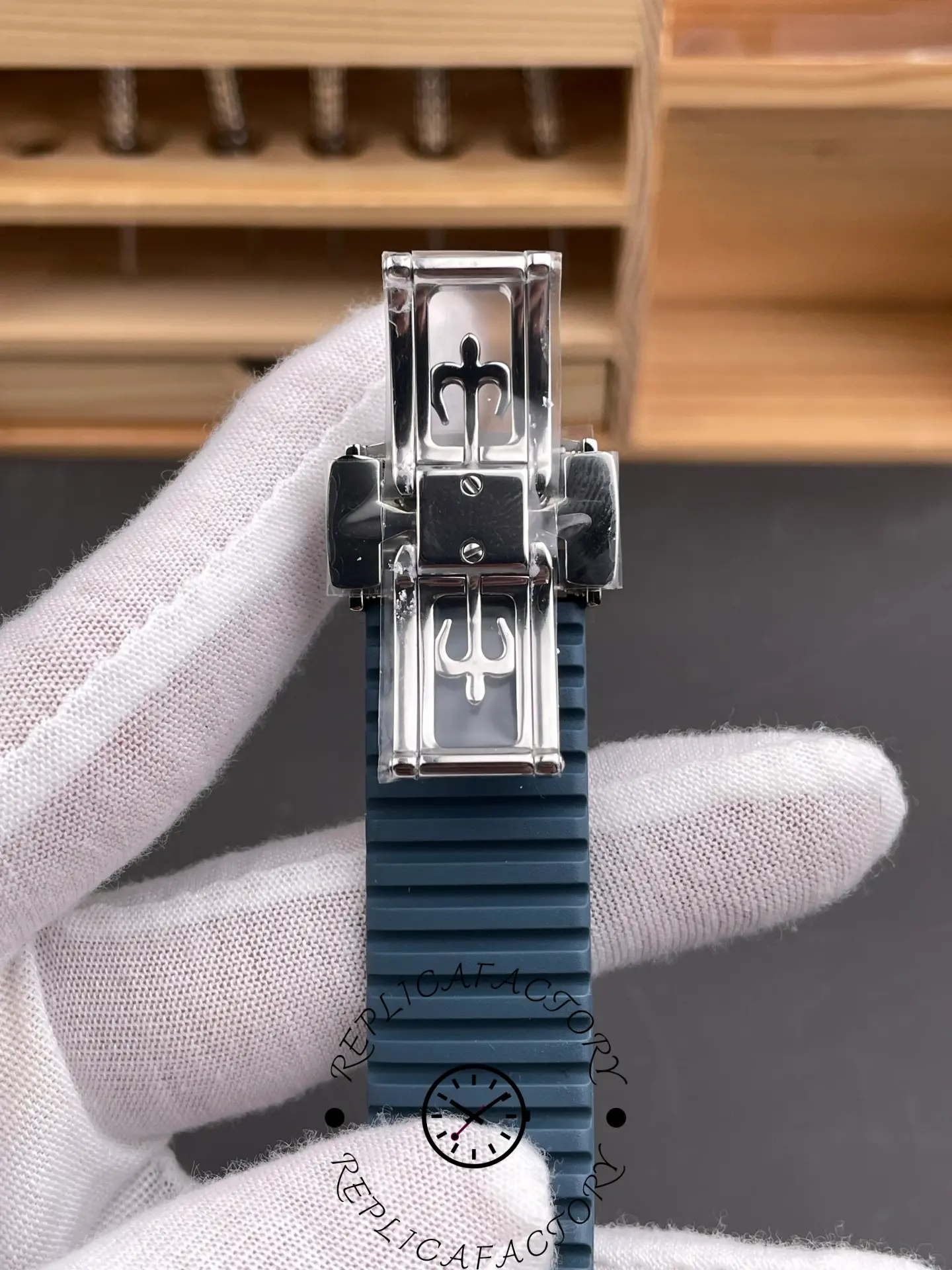 Deployant clasp detail of Patek Philippe Aquanaut 5164G-001 showing clasp mechanism and strap texture.