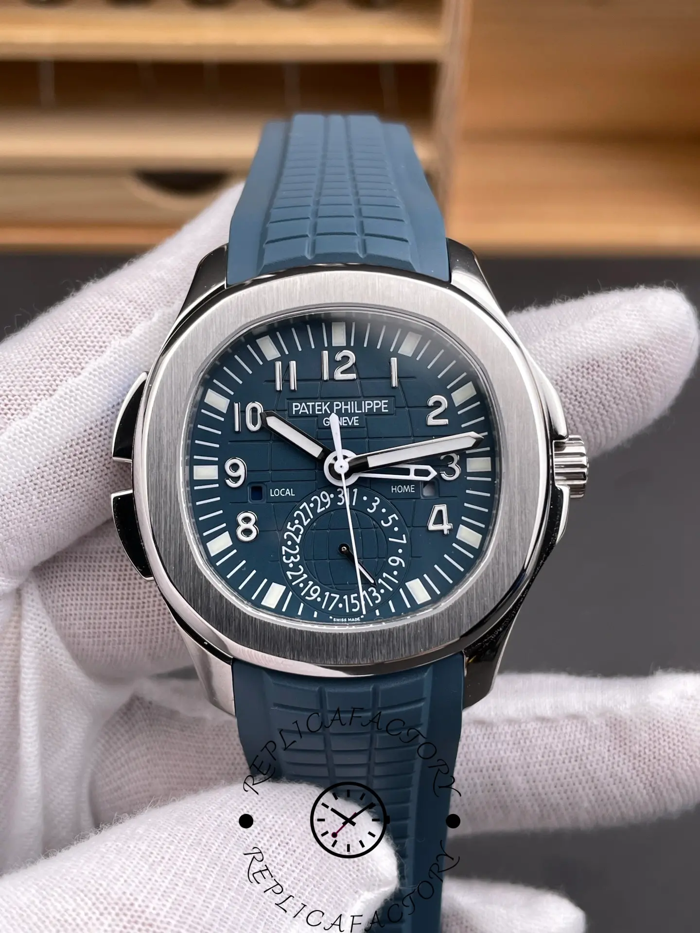 Front close-up of Patek Philippe Aquanaut 5164G-001 showing hands, indices, and minute track.