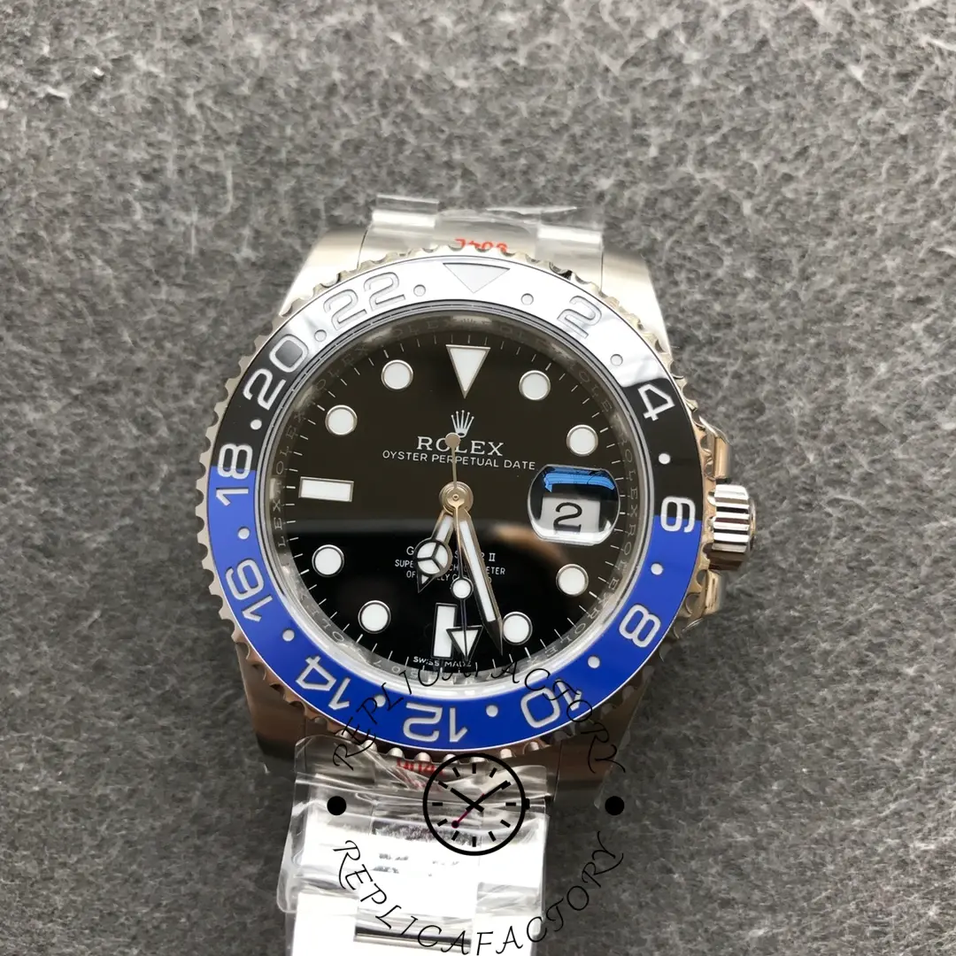 Rolex GMT-Master II Batman 116710BLNR laid flat, full watch view with bracelet.