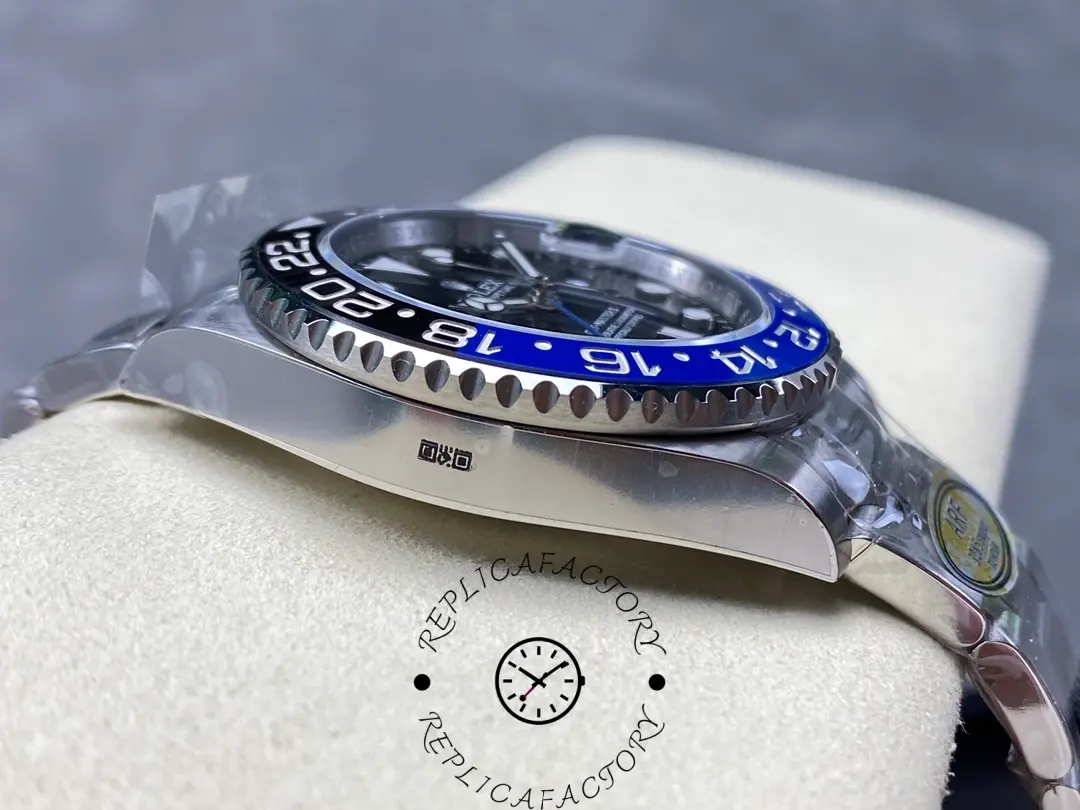 Rolex GMT-Master II 126710BLNR 0003 side view, case profile and blue-black bezel thickness, on cushion.