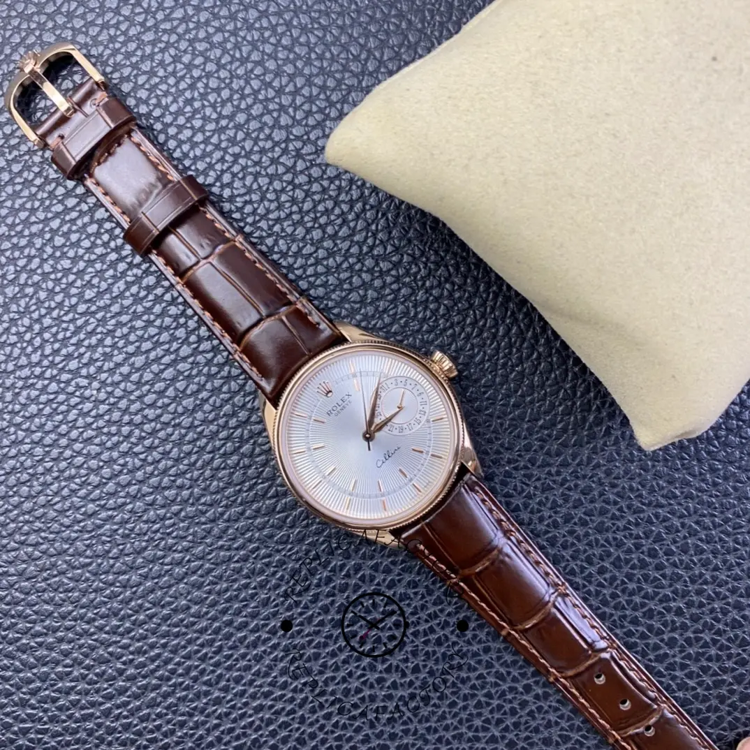 Rolex Cellini Date 50515 diagonal view, silver dial with rose gold case and brown strap.