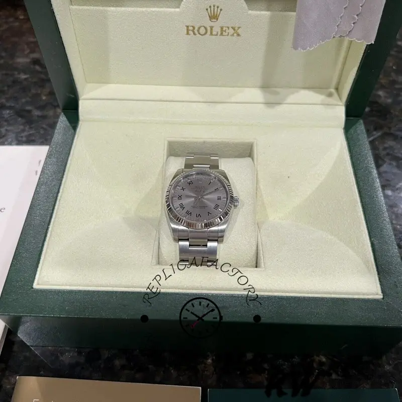 Rolex Air-King 114234 displayed in Rolex box, silver dial, bracelet visible.