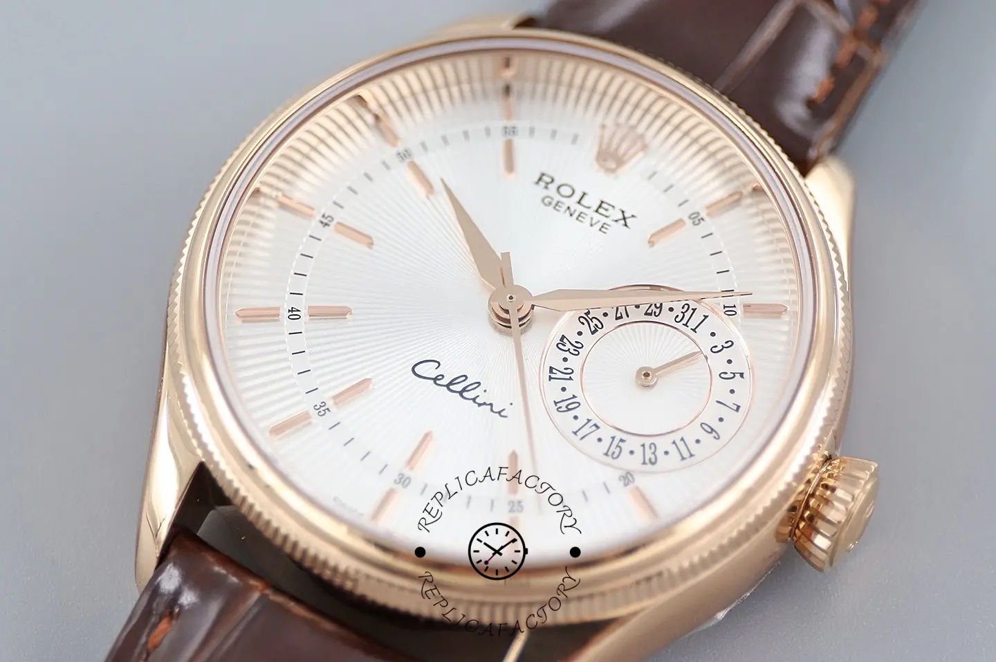 Rolex Cellini Date 50515 dial close-up, silver face with date window and rose gold markers.