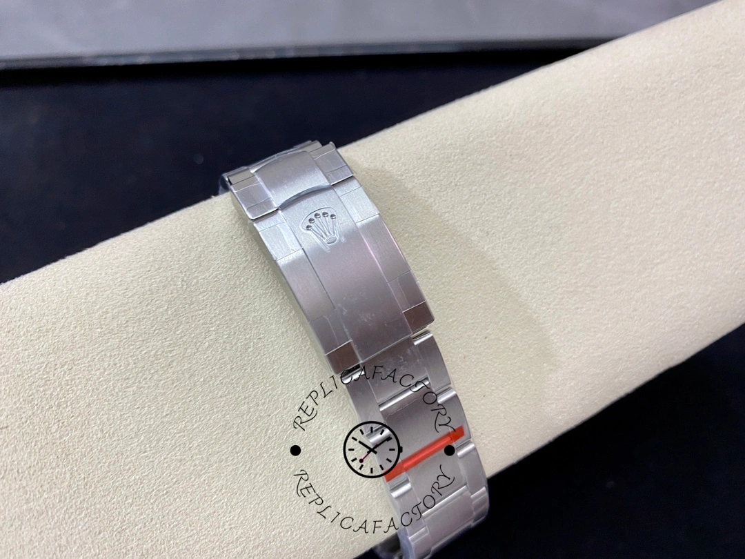 Rolex Air-King 116900, Oyster clasp closed view on cushion, bracelet finishing.