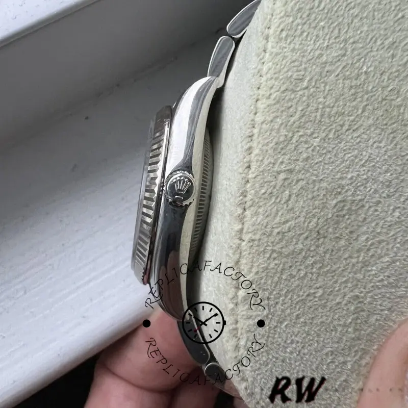 Rolex Air-King 114234 side profile showing case and crown, stainless steel bracelet.