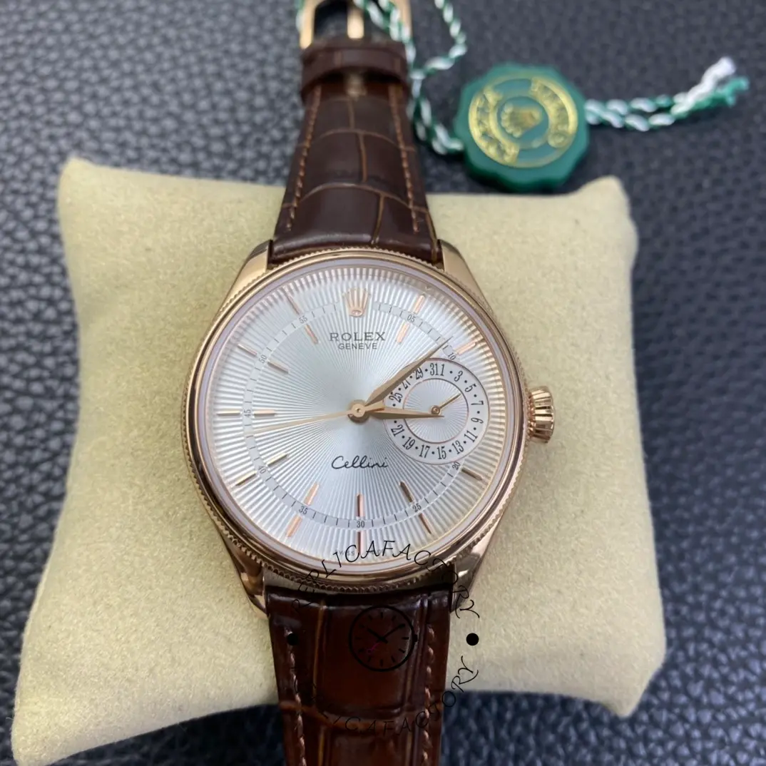 Rolex Cellini Date 50515 on cushion, silver dial and rose gold case, brown crocodile strap.