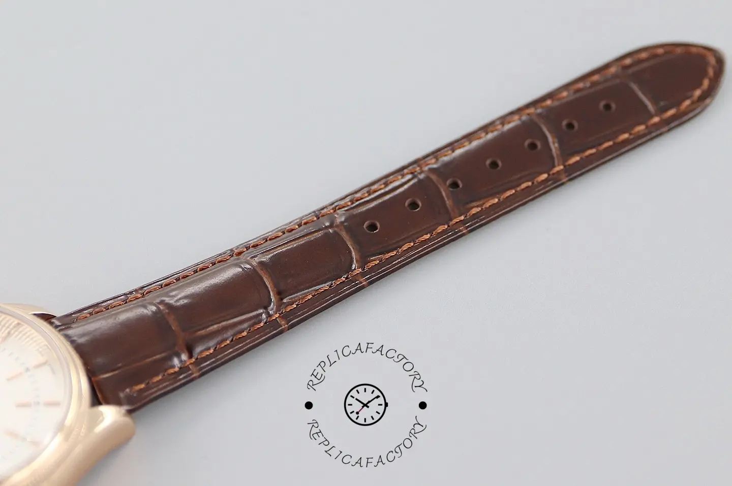 Rolex Cellini Date 50515 brown crocodile leather strap, full length view with stitching.