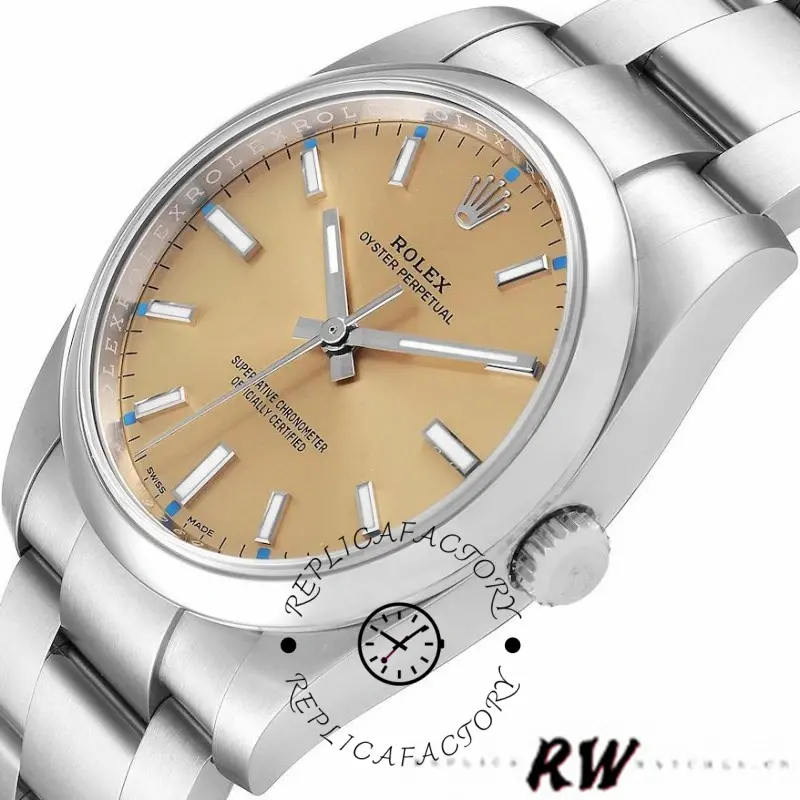 Rolex Oyster Perpetual 114200, dial close-up showing index markers and hands.
