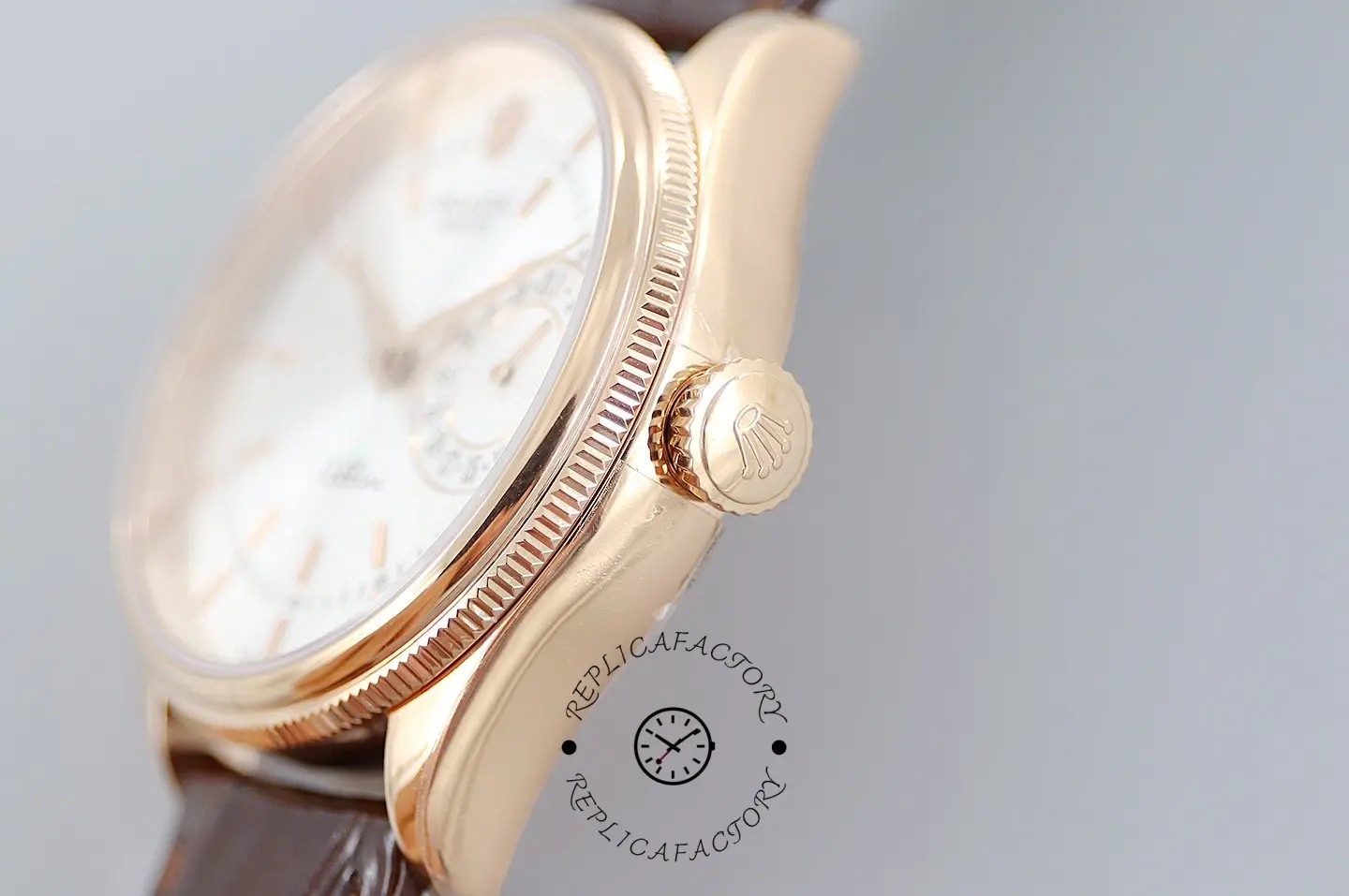 Rolex Cellini Date 50515 crown-side close-up, rose gold case and fluted crown.