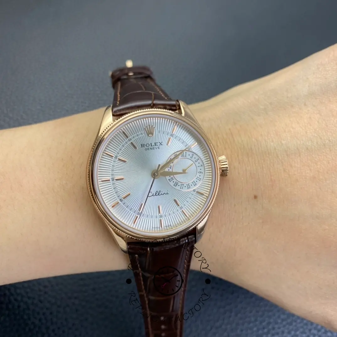 Rolex Cellini Date 50515 on wrist, silver dial and rose gold case with brown leather strap.